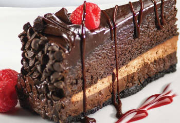 Chocolate Cake with Chocolate Sauce and Raspberries
