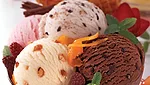 Scoops of different ice cream flavors