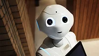 White Robot suggesting AI Trends 