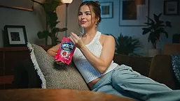 Addison Rae holding Nerds