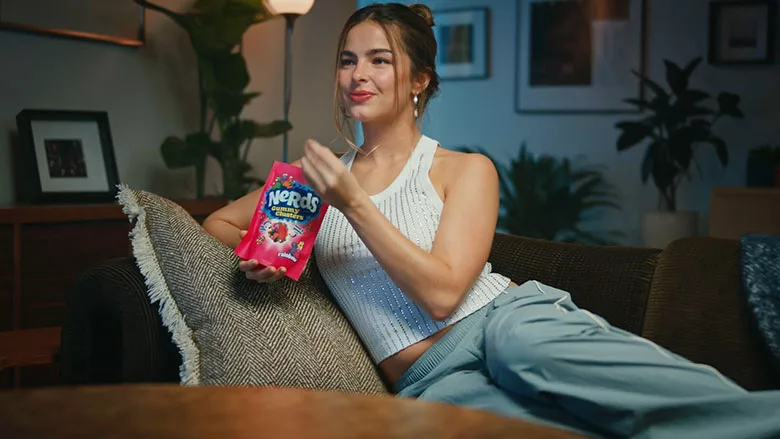 Addison Rae holding Nerds