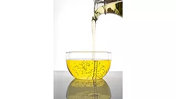 Algae Oil pouring into container