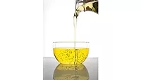 Algae Oil pouring into container