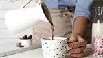 OWYN Hot Cocoa Pouring from Pitcher