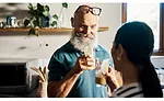 Man and Woman Cheers Health Drinks