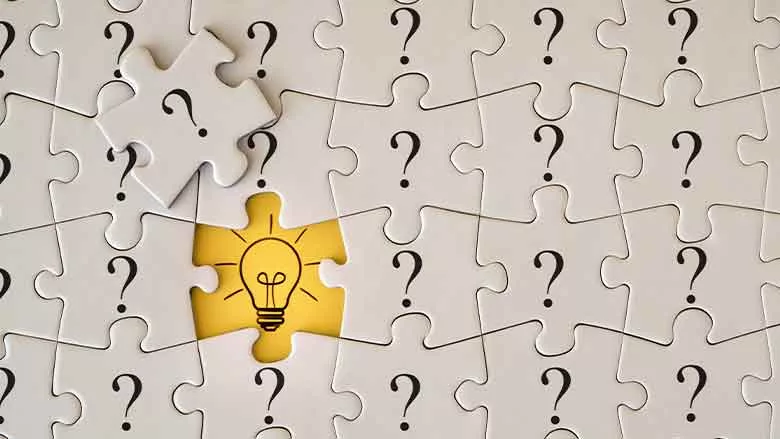 Puzzle Pieces with Lightbulb