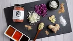 Chi Kitchen Sesame Slaw jar with table setting
