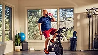 ADM Person On Exercise Bike