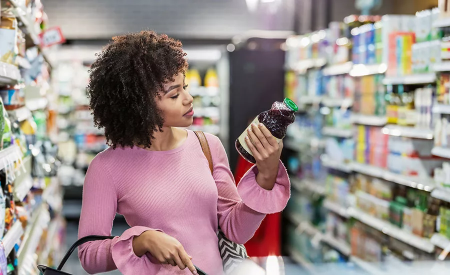 Consumer Inspecting Product Label