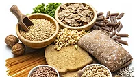 Whole-grain foods including bread, pasta, oats, cereal, and legumes.