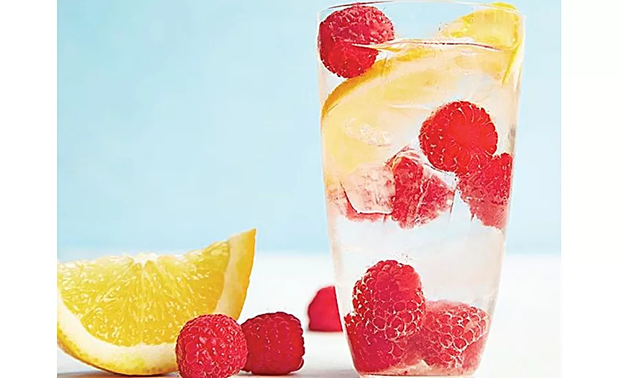 Water with lemon and raspberries