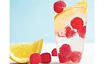 Water with lemon and raspberries