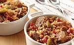 Marinating promotes flavor and tenderness by an interaction of acid and flavorants, such as herbs and spices
