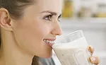 Girl drinking nutritional shake