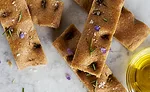 Focaccia is a flat oven-baked Italian bread product