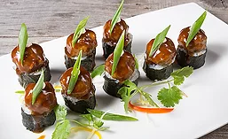The fusion of different cuisine ingredients and styles is beginning to transition from restaurant kitchens to meals and snacks for the mainstream