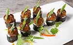 The fusion of different cuisine ingredients and styles is beginning to transition from restaurant kitchens to meals and snacks for the mainstream