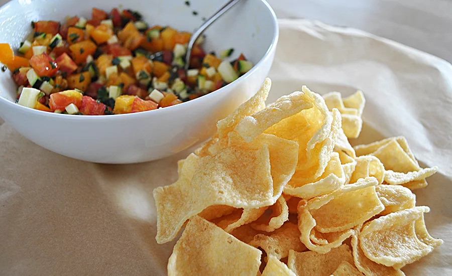Improved technology applied to flour from lentils and other non-allergenic legumes is making favorite snacks such as thin and crispy chips possible