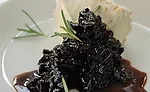 Pickled and fermented dried fruits, such as a tart vinegary pickled fig preserve, can actually boost savoriness with sharp acid contrasts