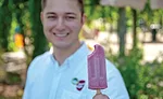 Man Holding A Jonny Pops Popsicle
