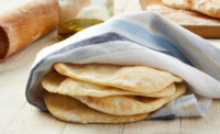 Slices of Flatbread Wrapped in Napkin