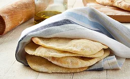 Slices of Flatbread Wrapped in Napkin