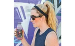 Teenage Girl Drinking Goodbelly Probiotics Beverage