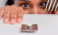 Woman Looking at Tiny Dessert