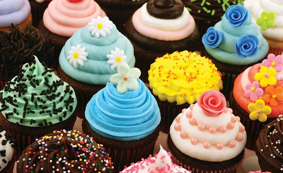 Colorful Icing on Chocolate Cupcakes