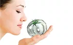 Woman Holding Silver Tomato