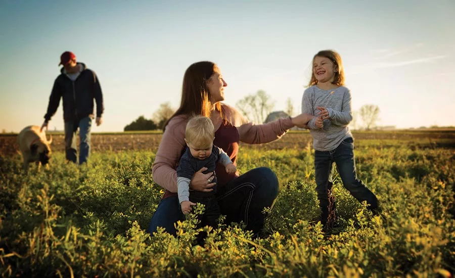 Family in Crop Field