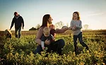 Family in Crop Field