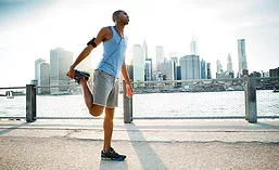 Man Stretching Before Run