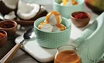 Bowl of Ice Cream Topped with Caramel