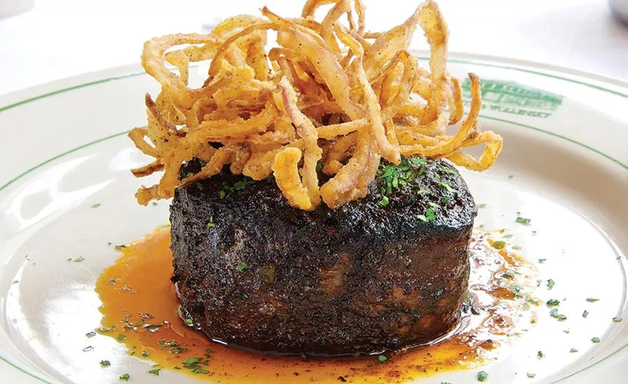 Meat Topped with Molé Sauce