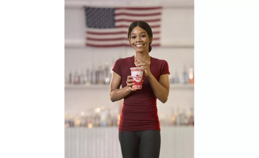 Gabby Douglas Holding Smoothie King Hydration Watermleon Smoothie