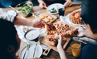 People eating pizza