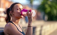 Woman drinking protein shake