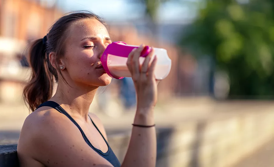 Woman drinking protein shake