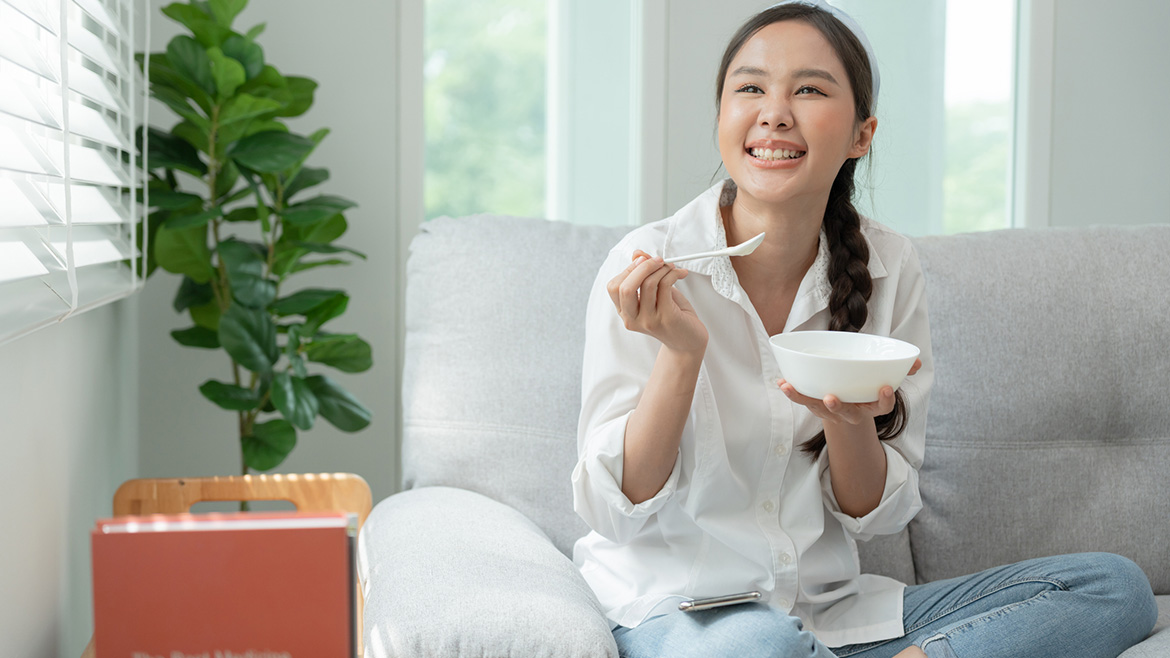 Women eating from bowl