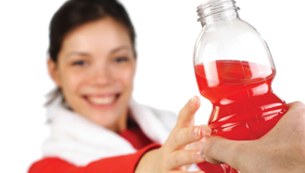 woman with red sports drink