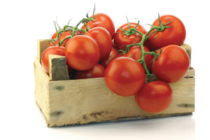 tomatoes in crate, tomatoes on vine