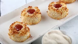 Coconut Macaroons on a long white plate.