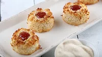 Coconut Macaroons on a long white plate.