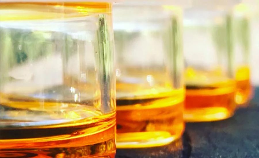 Jars of Golden Liquid